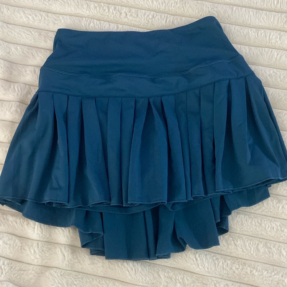 Dark blue/green athletic tennis skirt. Size xs.
